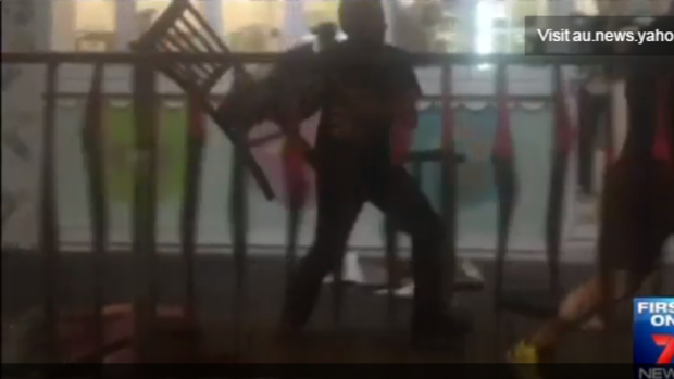 Men used chair to beat each other outside an ice cream parlour in Brighton-Le-Sands.