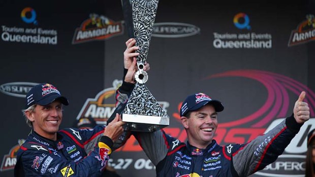 Craig Lowndes (right) and Warren Luff celebrate their win.