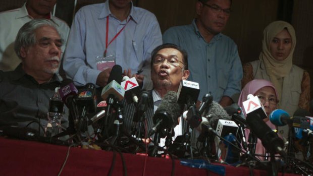 Leader of Pakatan Rakyat, Anwar Ibrahim presents accusations of electoral fraud during a press conference in One World Hotel on May 6, 2013 in Kuala Lumpur, Malaysia.