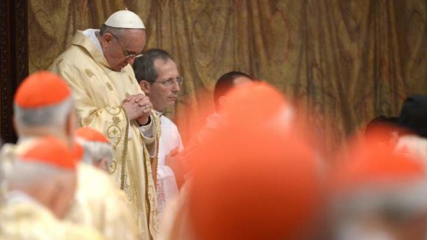 Pope Francis I leads his first public mass with cardinals at the Sistine Chapel.