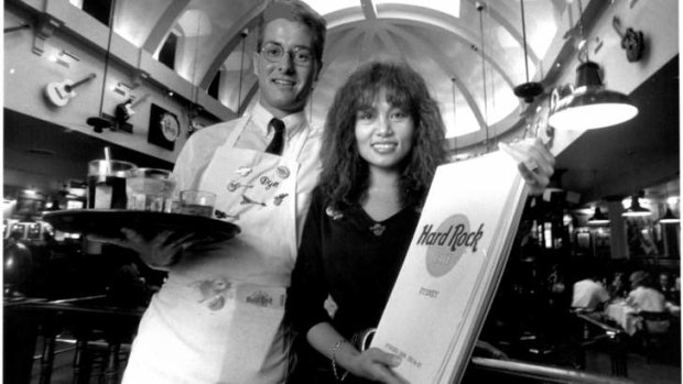 Too much debt: Waiter David Wilson and hostess June Dries serve customers at the cafe in 1989.