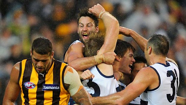 Geelong celebrate after the final siren.