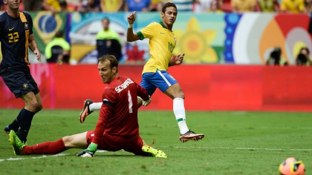 Neymar of Brazil shoots for goal.