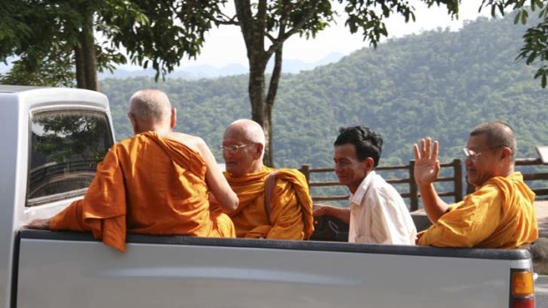 Heart of the hills ...  monks on the road.