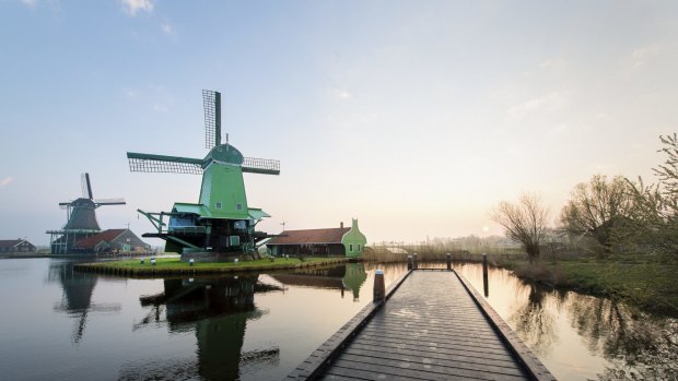 Typical scene: Traditional Dutch windmills at the Zaanse Schans in The Netherlands, seen from a yetty.