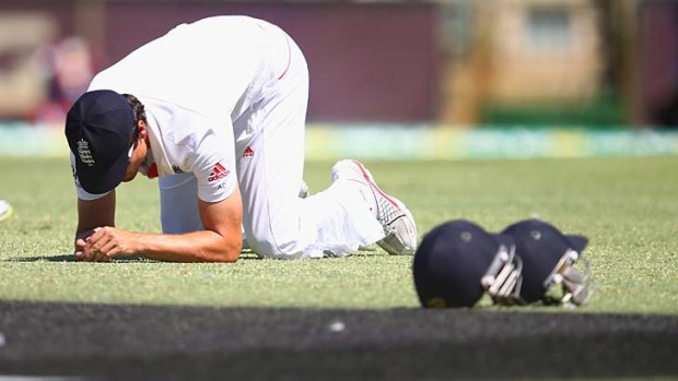 England captain Alastair Cook is a forlorn figure after dropping Chris Rogers at the WACA on Sunday.