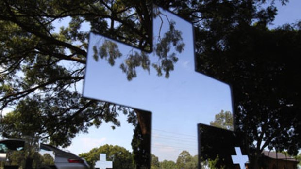 Hoping to attract more visitors to the cemetery... A glass scultpure called Reflections by Kylie Bowles.