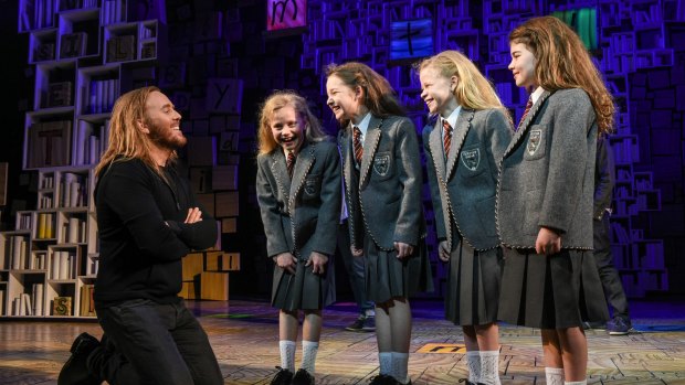 Tim Minchin with the four Sydney Matildas (from left) Georgia Taplin, Bella Thomas, Sasha Rose and Molly Barwick. 