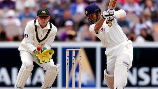 Sachin Tendulkar smashes a four from the bowling of Shane Warne.