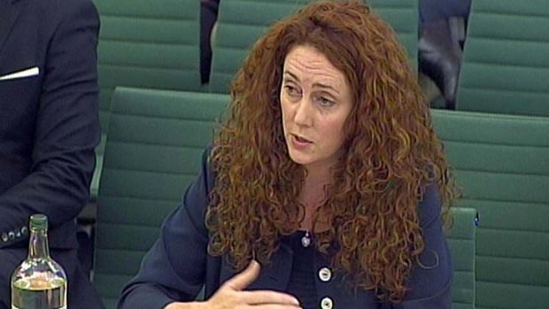 Defending herself ... Rebekah Brooks gives evidence on the News of the World phone hacking scandal.