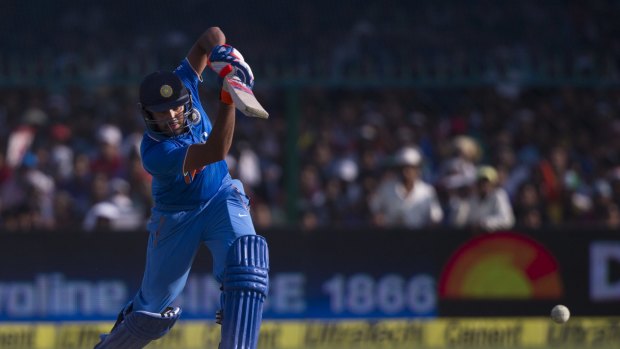 India's Rohit Sharma drives elegantly during his innings of 150.