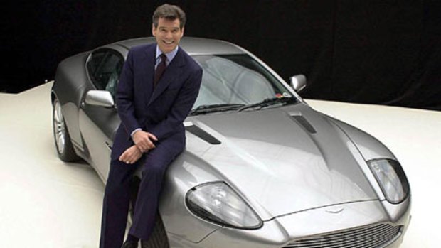 Pierce Brosnan was the fifth actor to play James Bond. He is pictured here in 2002 with an Aston Martin Vanquish.