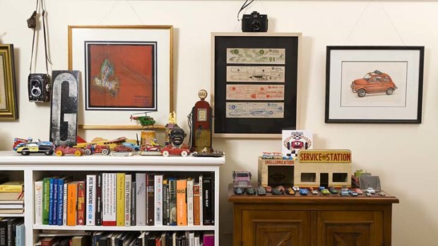 His and Hers: Photographer/meditation teacher Gregory McBean’s home office is pure boy’s zone filled with model cars, trucks, ephemera and an old child’s toy servo.