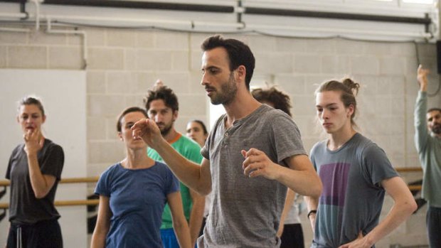 Hofesh Shechter with his dancers during rehearsals for <i>Sun</i>.