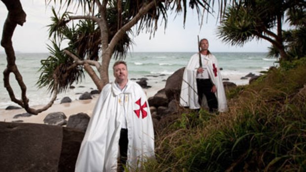 ‘We’re not just whirling dervishes with swords and capes.’’ ... Knights Templar Paul Grice and Anthony Auguste Rousseau at Coolangatta.