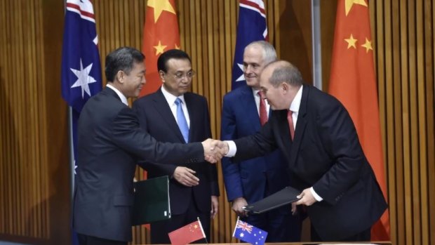 CSCEC president Wang Xianming, Chinese Premier Li Keqiang, Australian Prime Minister Malcolm Turnbull and BBI Group chairman Jon Young at the signing ceremony.