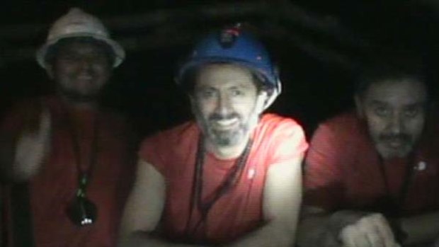A frame grab shows some of the 33 miners trapped underground in a copper and gold mine at Copiapo, about 725 km  north of Santiago.