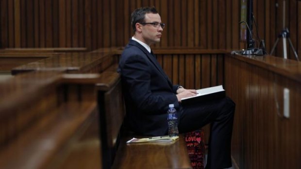 Oscar Pistorius cuts a lonely figure in court.