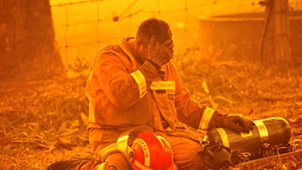 Harrowing scenes ... A firefighter in Black Saturday bushfires.