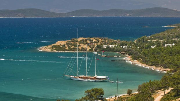 A gulet is  moored in bay in the  Bodrum Peninsula in Turkey.