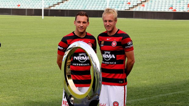 Western Sydney Wanderers Brendon Santalab and Mitch Nichols with the Hyundai A-League Championship Trophy at Parramatta Stadium.