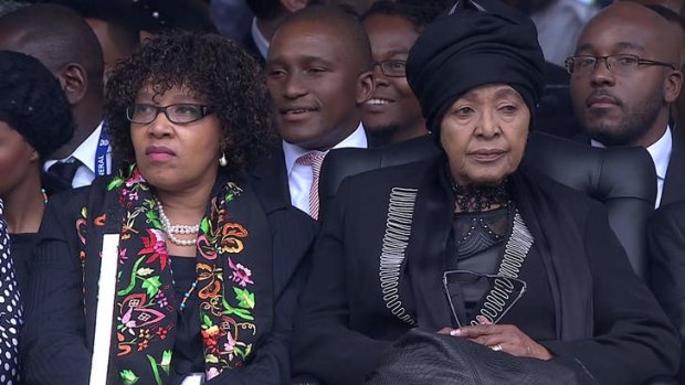 Nelson Mandela's daughter Zindzi, pictured with her mother Winnie at her father's funeral in December 2013, will attend the Oscars with her sister Zenani.