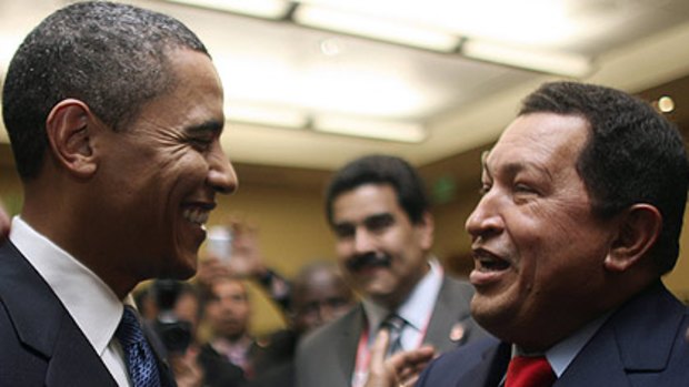 First meeting ... US President Barack Obama greets  Venezuelan President Hugo Chavez.