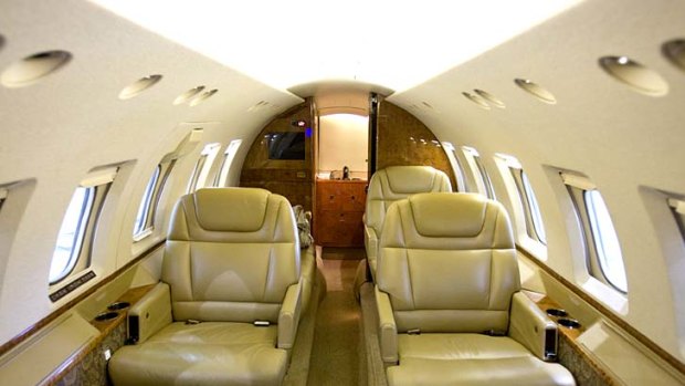 The interior of a Raytheon Hawker 800 jet. Fractional ownership of private jets and use of jet cards is on the rise in the US as commercial travel frustrates flyers, despite the high cost