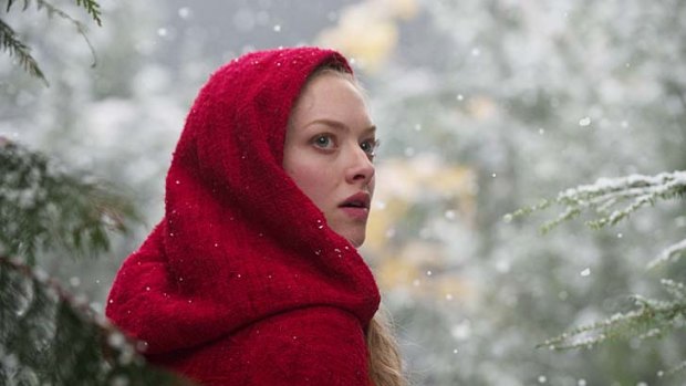 Amanda Seyfried ...  gets by on three expressions — wonder, bewilderment and a frozen-faced commingling of both.