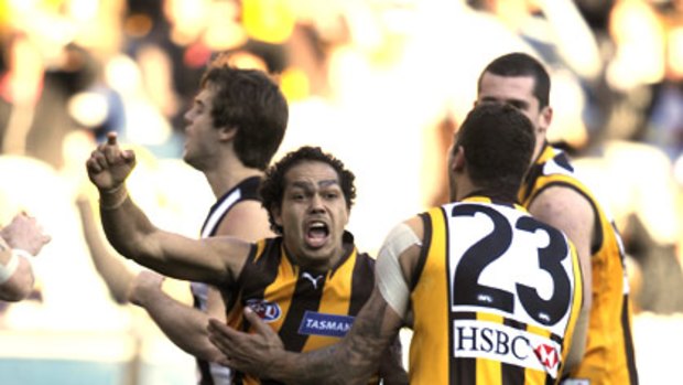 Rhan Hooper celebrates a goal with Lance Franklin (no.23) in Hawthorn's round 22 victory over Collingwood earlier this year.