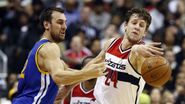 That's magic: Andrew Bogut's Golden State Warriors are up to nine straight wins after a dominant victory over the Washington Wizards on Sunday. Photo: AP