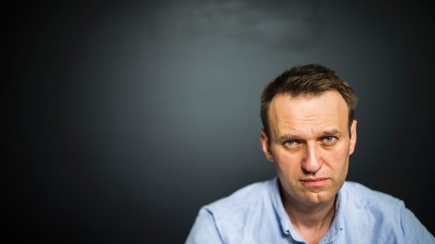Video blogger and opposition politician Alexei Navalny records a video for his Youtube channel in his office in Moscow