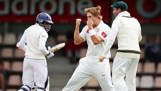 True Test: Shane Watson celebrates taking the wicket of Tillakaratne Dilshan.