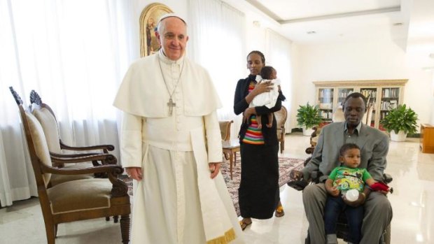 Pope Francis with Meriam Ibrahim, accompanied by her children Maya in her arms, Martin, and her husband, Daniel Wani.