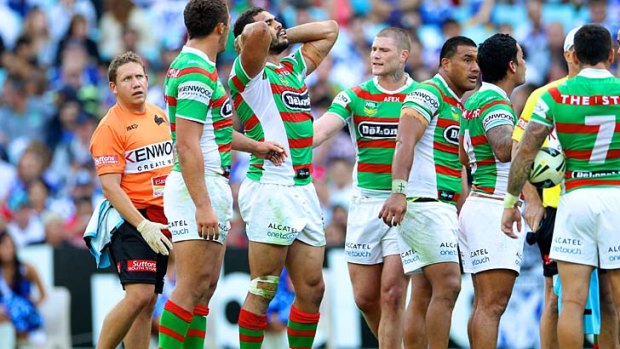 Head first: Greg Inglis after the Inu tackle.