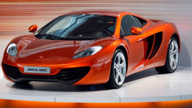 The new Mclaren MP4-12C road car is unveiled at the Mclaren Technology Centre in Woking, England.