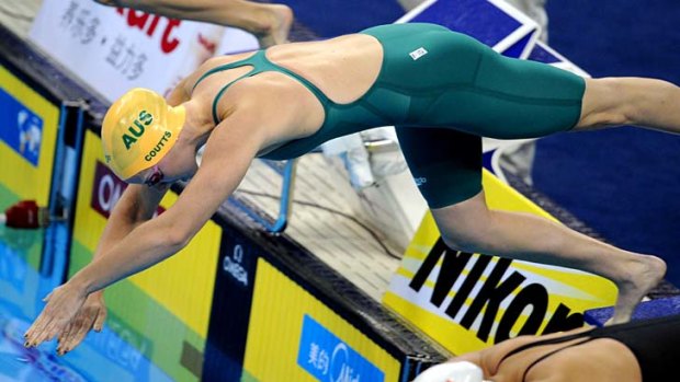 Australia's Alicia Coutts (L) and China's Tang Yi compete in the heats of the women's 100-metre freestyle.