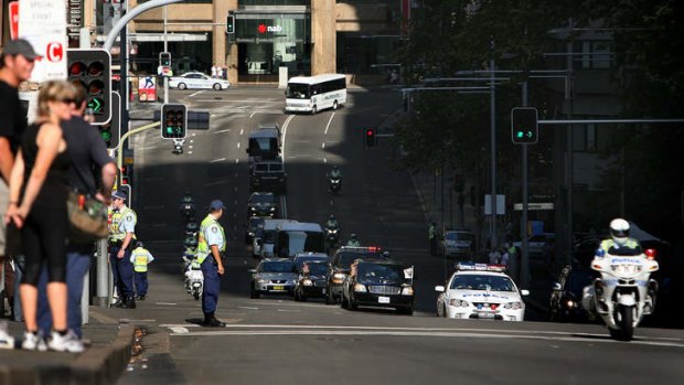 Behind the scenes: Dick Cheney's motorcade driving through Sydney at the end of his visit, the day Adam Grills was injured.