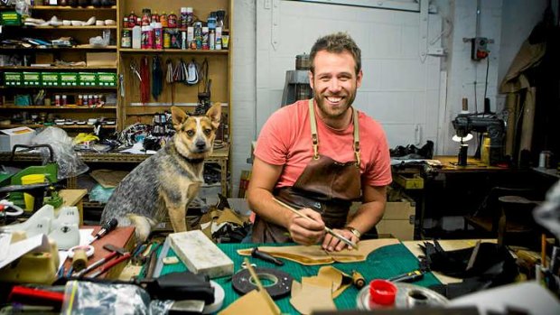 Sole trader: Jess Cameron-Wootten, with dog Bill, bought a shoemaking business.