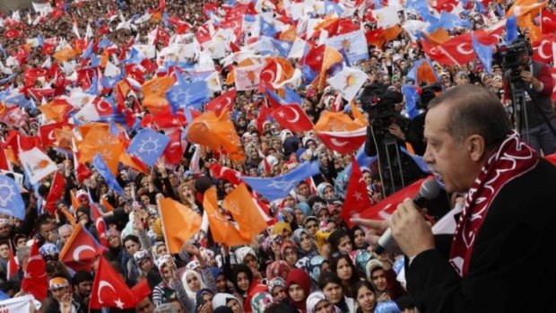 Campaign trail: Tayyip Recep Erdogan addresses supporters during an election rally on Thursday.