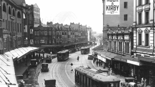 A tram moves through George Street back in 1931.