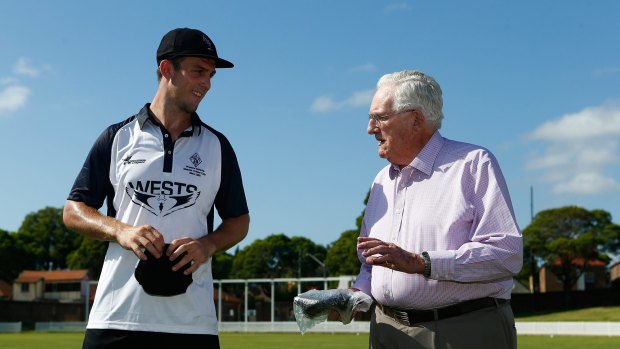 Sharing his knowledge: Australian Test all-rounder Mitchell Marsh talks to cricket great Alan Davidson.