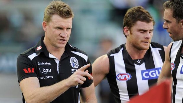 Words that count: Collingwood coach Nathan Buckley at quarter time at the MCG on June 10.