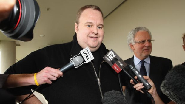 Kim Dotcom briefly speaks to media after being released on bail at North Shore District Court today