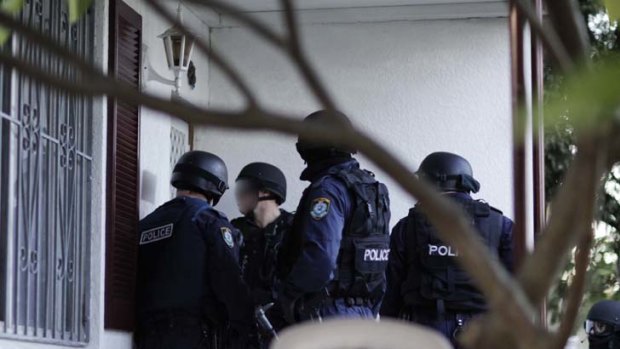 Police raid one of the  properties linked to the Hells Angels and Nomads bikie gangs.