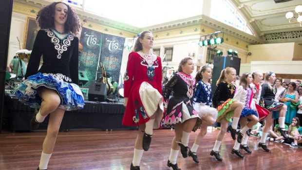 The Queensland Irish Dancing Association dancers perform at the Irish Club after the St Patrick's day Parade in Brisbane on March 16, 2013.