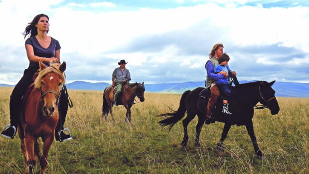 New horizons: The Isaacson family in Mongolia during the filming of <i>The Horse Boy</i> in 2007.