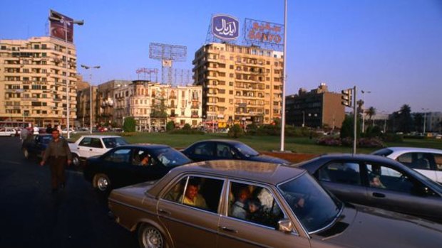 Cairo traffic is crazy ... but accepting help getting across may come with a price.
