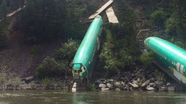 The fuselages lie on the embankment of the Clark Fork River, Montana.