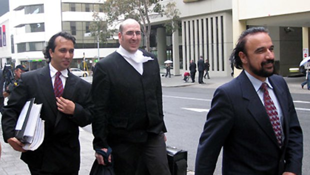 Zubair Sayed (left), lawyer Andrew Skerritt and Anwar Sayed leave court after being acquitted.